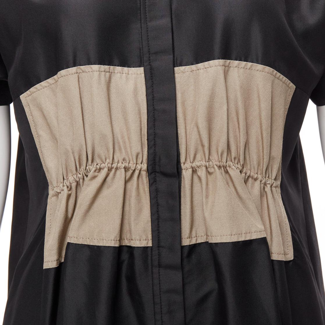 BALENCIAGA 2011 black khaki silk blend colorblock ruched shirt dress FR36 S
Reference: DYTG/A00042
Brand: Balenciaga
Designer: Nicolas Ghesquiere
Collection: 2011
Material: Silk, Blend
Color: Black, Khaki
Pattern: Solid
Closure: Button
Extra