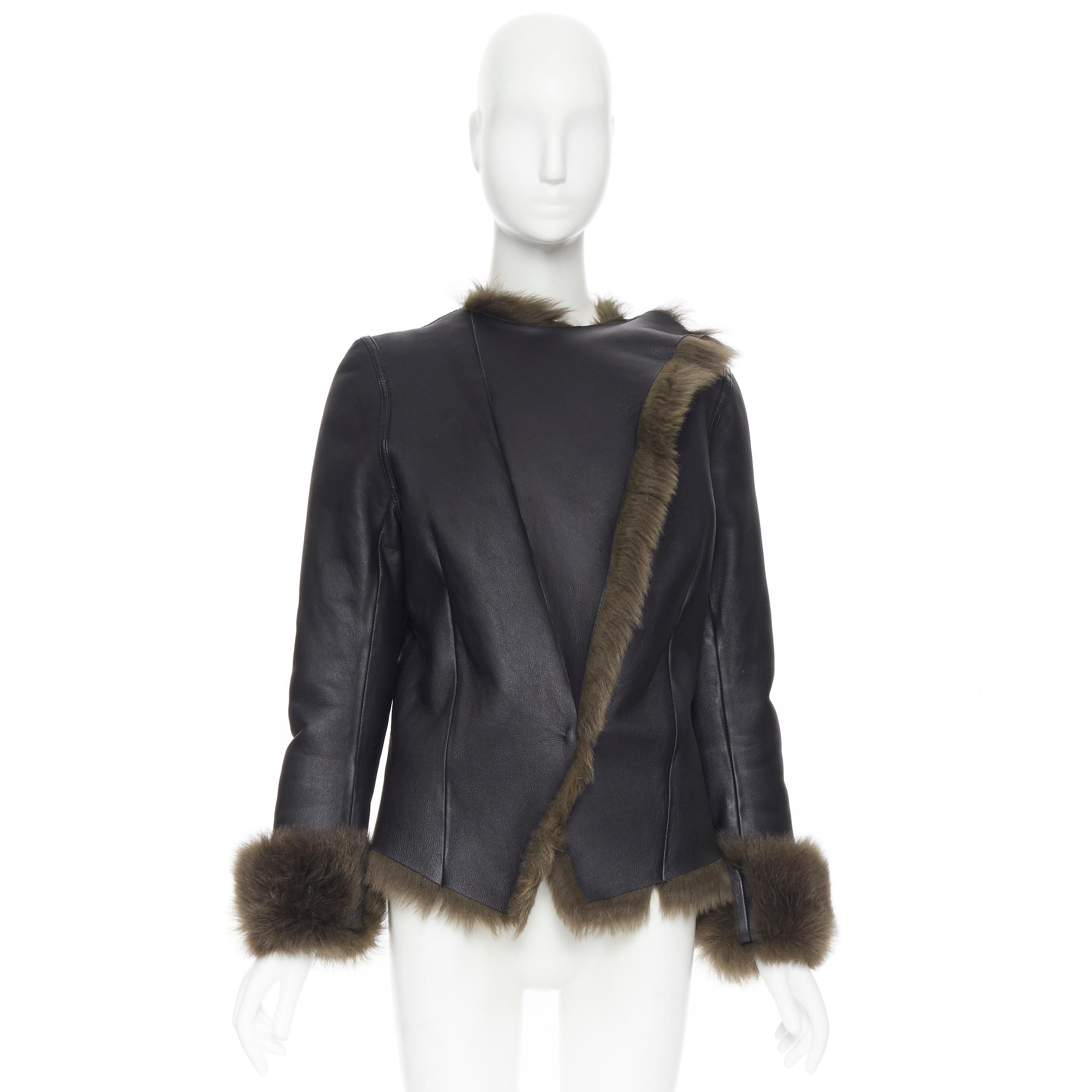 BALENCIAGA 2012 black leather green fur lined moto winter jacket FR40 M 
Reference: CC/AECG00331 
Brand: Balenciaga 
Collection: 2012 
Material: Leather 
Color: Black 
Pattern: Solid 
Closure: Hook & Eye 
Extra Detail: Fully lined in fur. 
Made in: