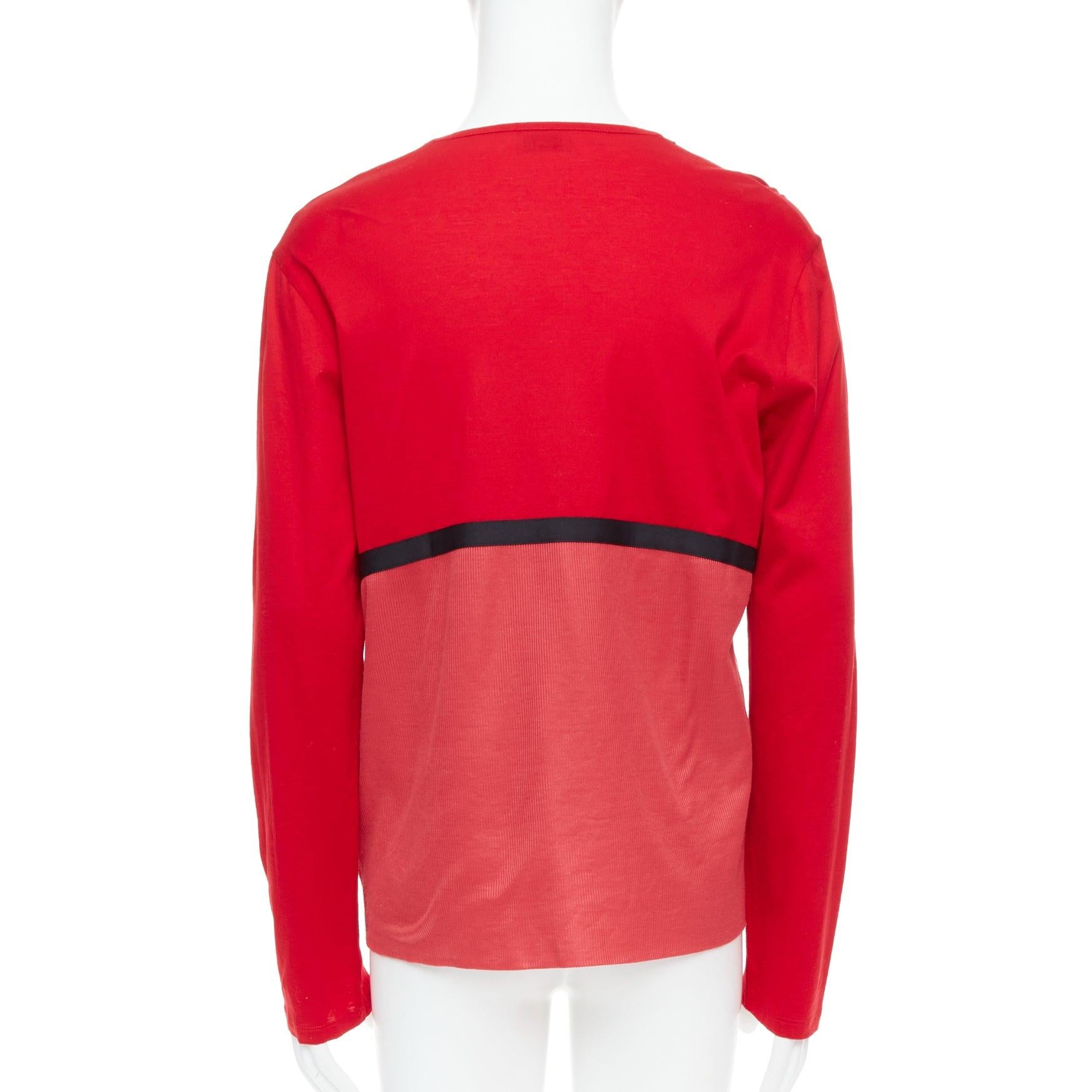 BALENCIAGA 2012 red cotton blend black trim V-neck long sleeve top XL
Reference: PRCG/A00012
Brand: Balenciaga
Designer: Nicolas Ghesquiere
Collection: 2012
Material: Cotton, Blend
Color: Black, Red
Pattern: Solid
Closure: Pullover
Extra Details: