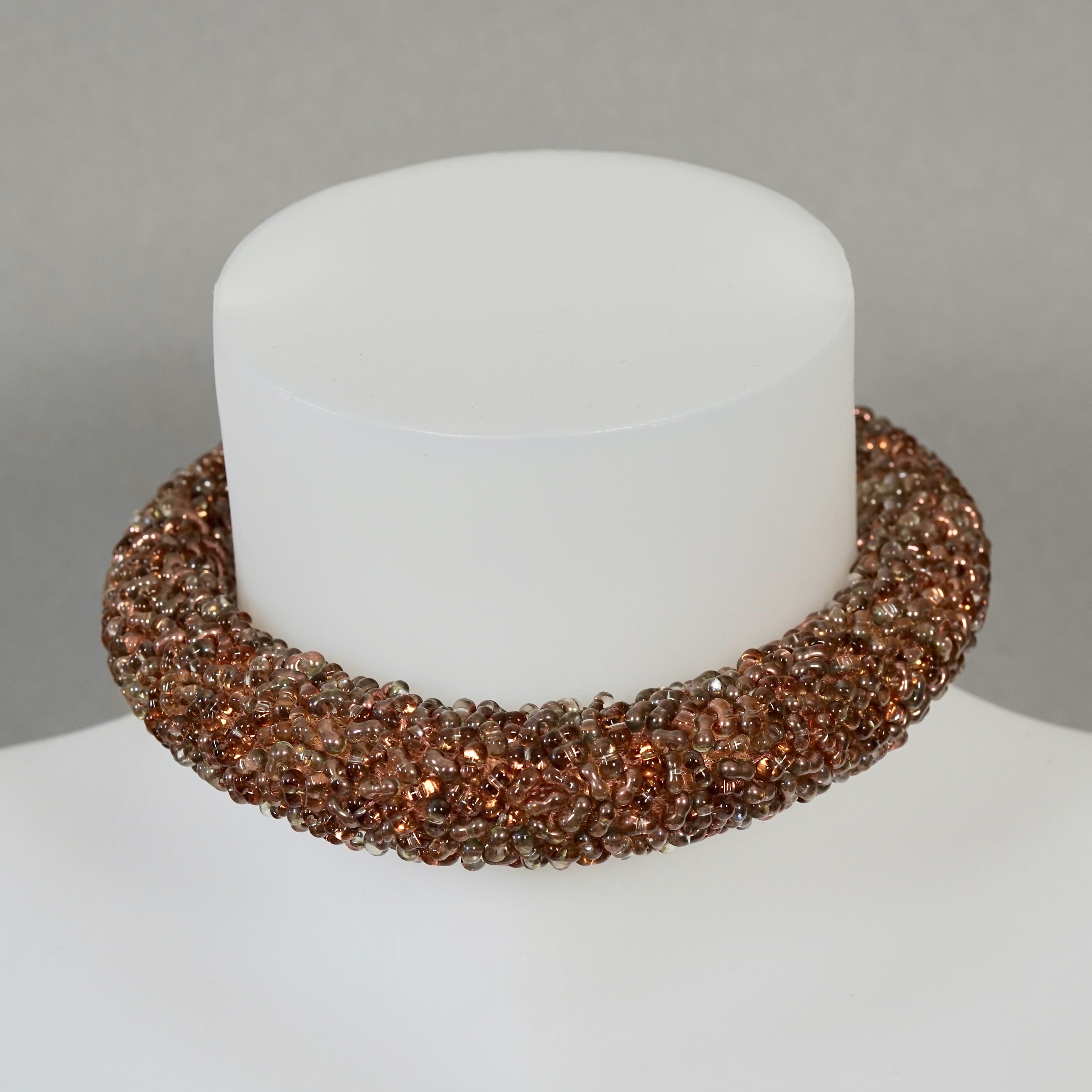 BALENCIAGA 2014 Beaded Bronze Tube Choker Necklace
Alexander Wang's first resort collection.

Measurements:
Thickness: 1.98 inches (2.5 cm)
Wearable Length: 12.20 inches (31 cm)

Features:
- 100% Authentic BALENCIAGA.
- Thick bronze tone tube choker