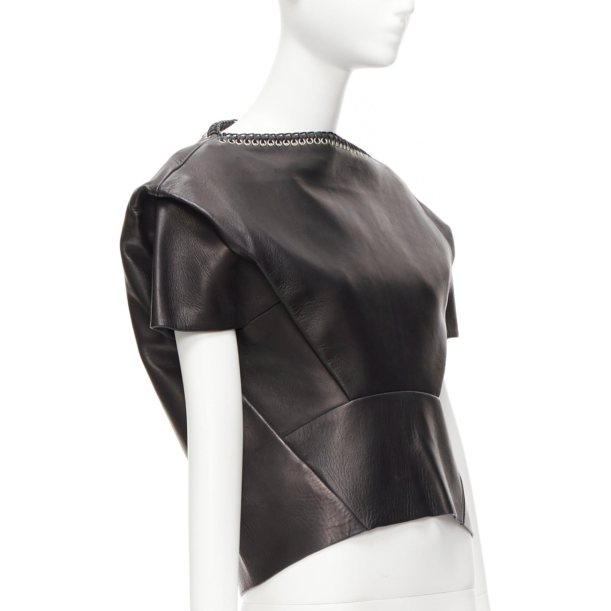 BALENCIAGA 2014 black lambskin leather grommet stud boxy cropped top FR36 S
Reference: SSLG/A00005
Brand: Balenciaga
Collection: 2014
Material: Lambskin Leather
Color: Black, Silver
Pattern: Solid
Closure: Zip
Lining: Black Leather
Extra Details: