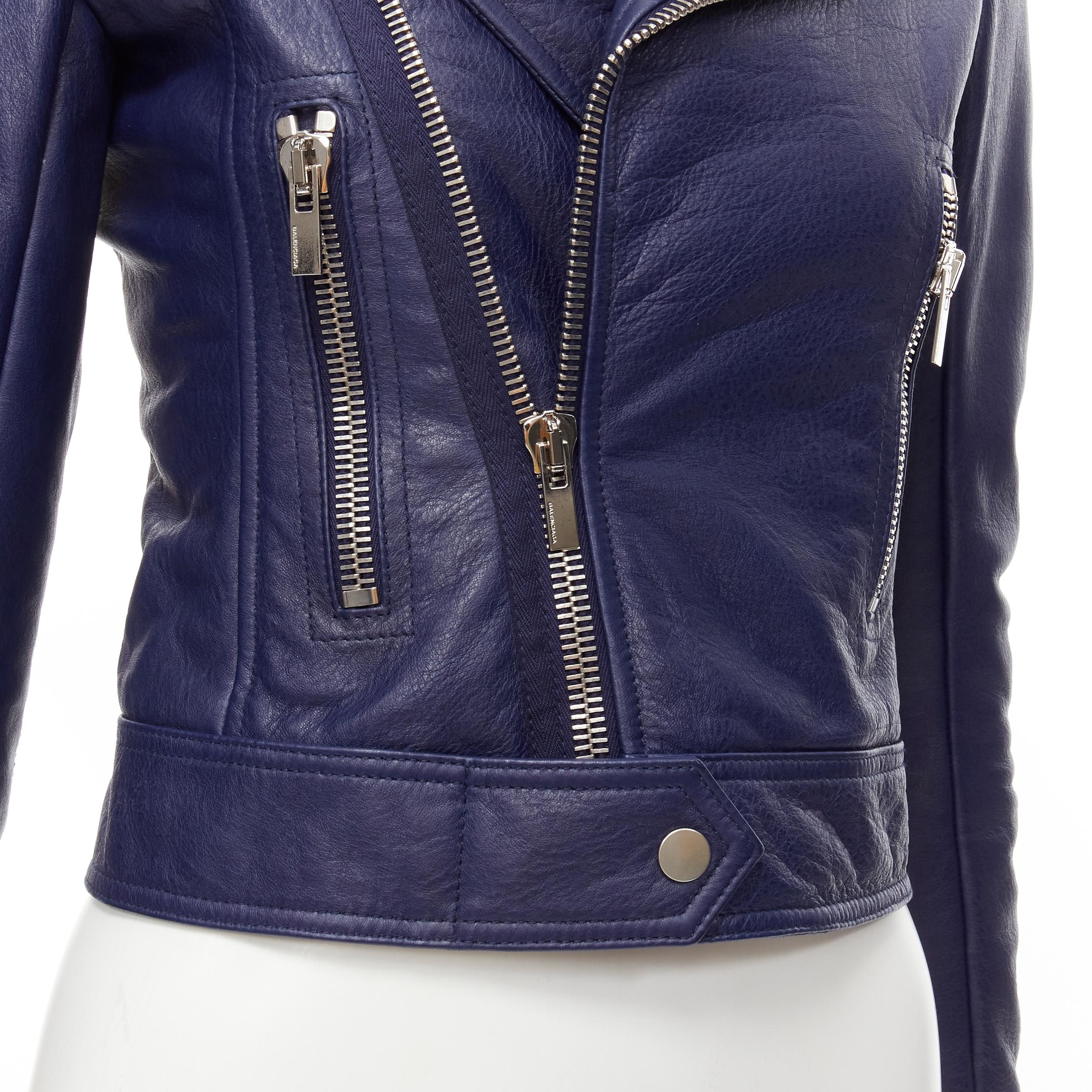 BALENCIAGA 2014 dark blue lambskin leather cropped fit biker jacket FR34 XS 
Reference: LNKO/A01842 
Brand: Balenciaga 
Designer: Nicolas Ghesquiere 
Collection: 2014 
Material: Leather 
Color: Blue 
Pattern: Solid 
Closure: Zip 
Extra Detail: