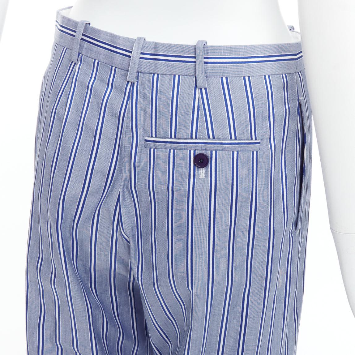 BALENCIAGA 2016 blue white striped cotton casual pajama pants FR34 XS
Reference: NKLL/A00407
Brand: Balenciaga
Designer: Demna
Collection: 2016
Material: Cotton
Color: Blue, White
Pattern: Striped
Closure: Zip Fly
Extra Details: Single back