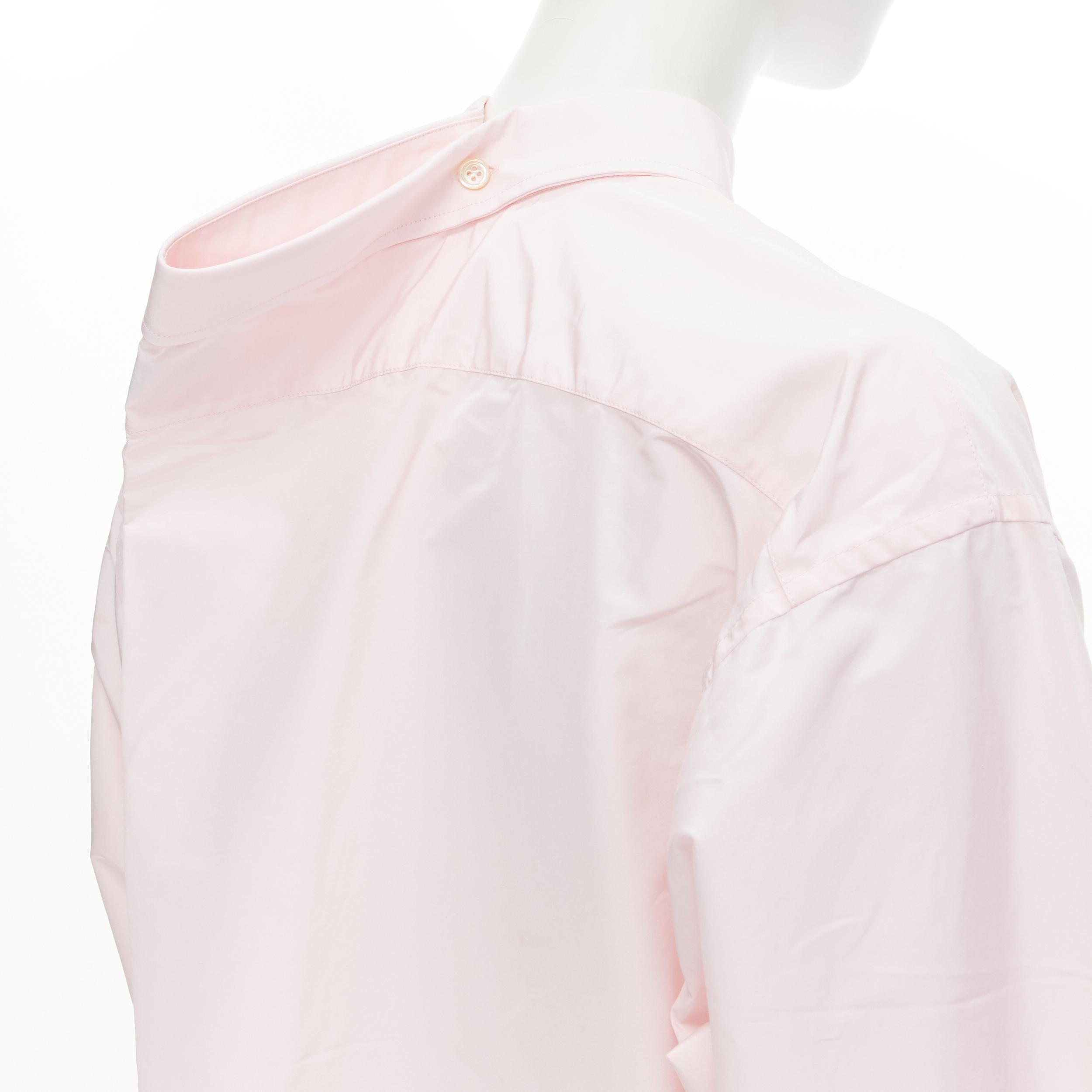 BALENCIAGA 2016 pink button pinched collar oversized shirt FR38 S 
Reference: MELK/A00122 
Brand: Balenciaga 
Designer: Demna 
Collection: 2016 
Material: Cotton 
Color: Pink 
Pattern: Solid 
Closure: Button 
Extra Detail: Oversized collar with