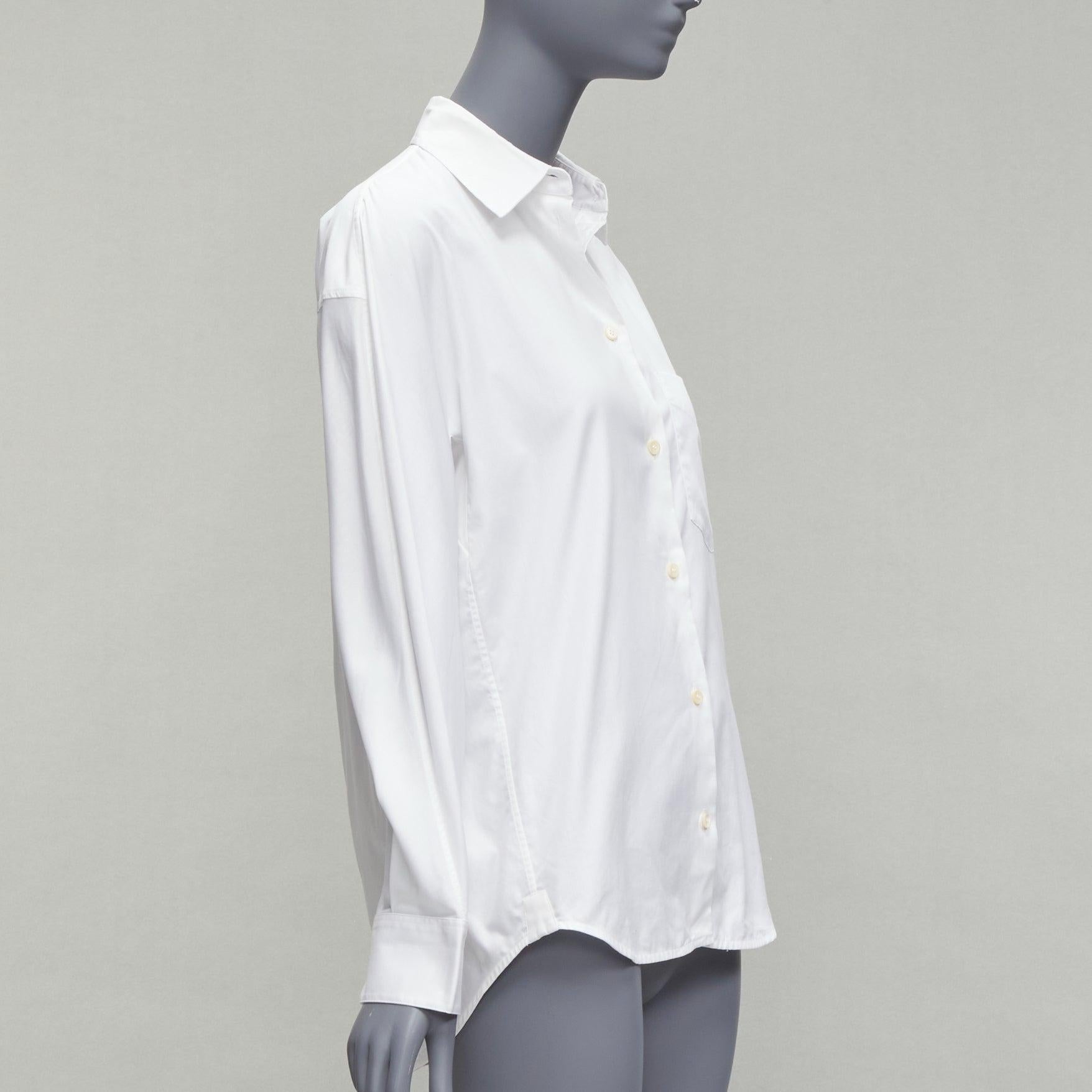 BALENCIAGA 2016 white curved hem topstitch pocket shirt FR36 S
Reference: CAWG/A00281
Brand: Balenciaga
Collection: 2016
Material: Cotton
Color: White
Pattern: Solid
Closure: Button
Made in: Italy

CONDITION:
Condition: Very good, this item was