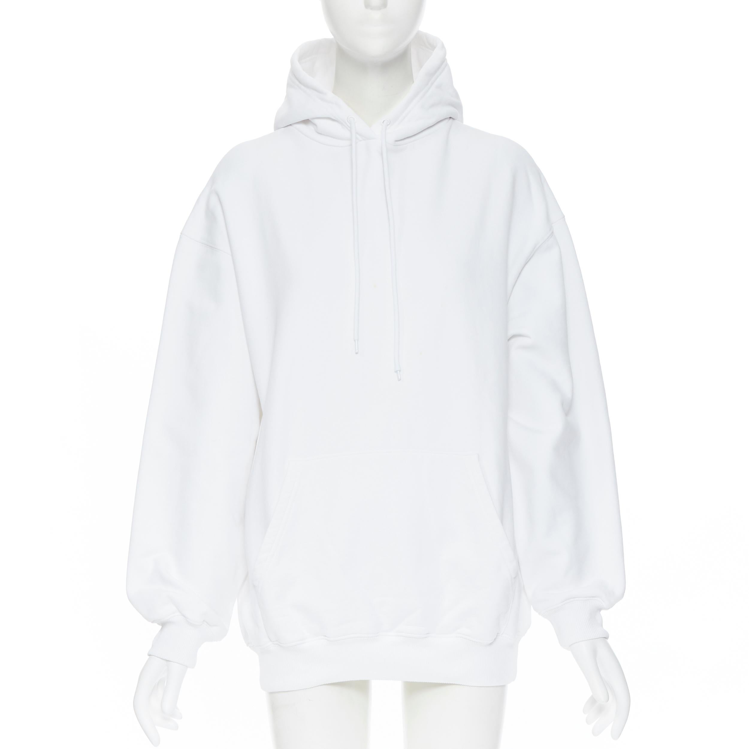 BALENCIAGA 2017 100% cotton white black logo print back oversized hoodie  XS
Brand: Balenciaga
Designer: Demna Gvasalia
Collection: 2017
Model Name / Style: Hoodie
Material: Cotton
Color: White
Pattern: Solid
Extra Detail: Drawstring. Kangaroo