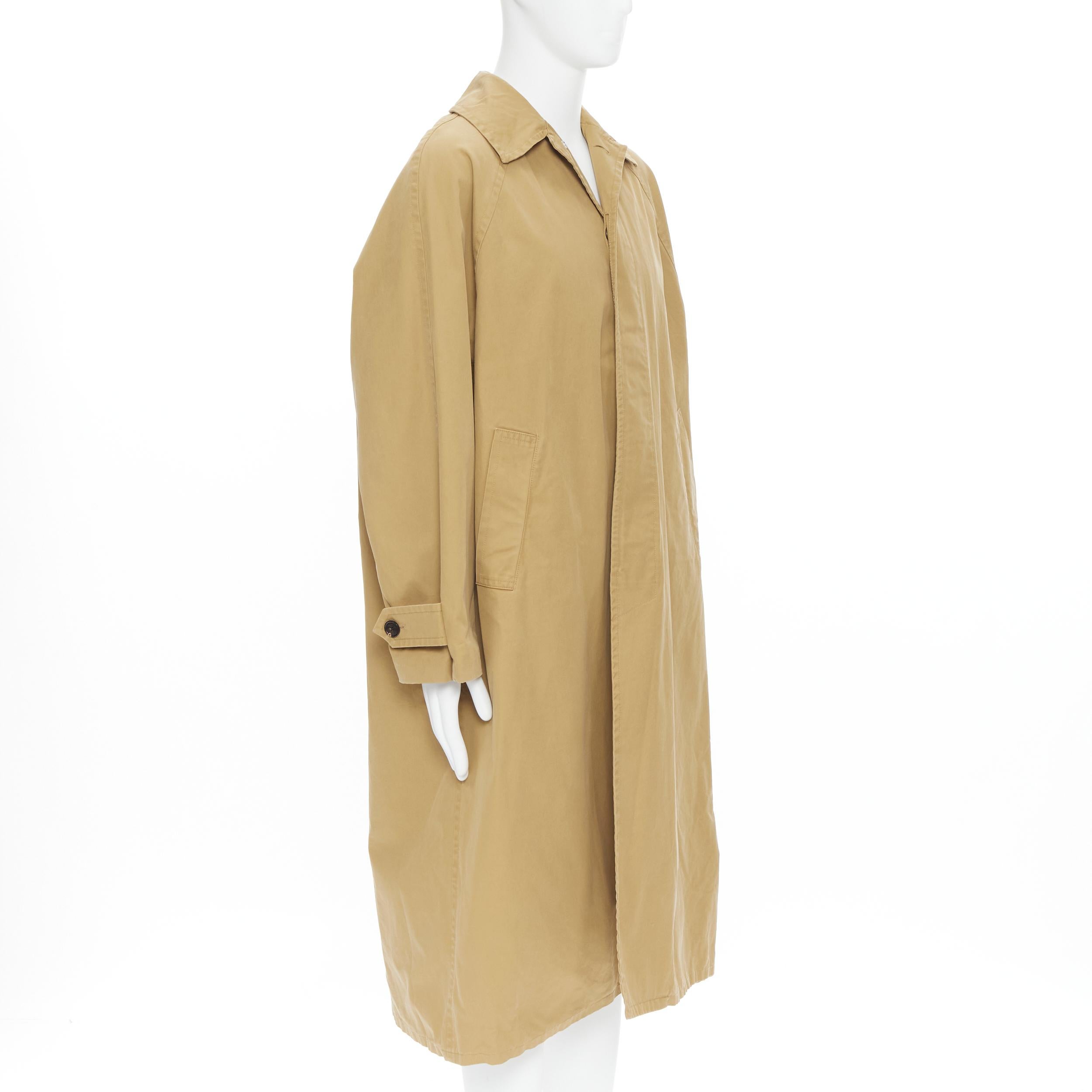 BALENCIAGA 2018 beige heavy cotton rounded shoulder oversized XL car coat 
Reference: EDTG/A00060 
Brand: Balenciaga 
Designer: Demna Gvasalia 
Material: Cotton 
Color: Beige 
Pattern: Solid 
Closure: Button 
Extra Detail: Heavy weight cotton.