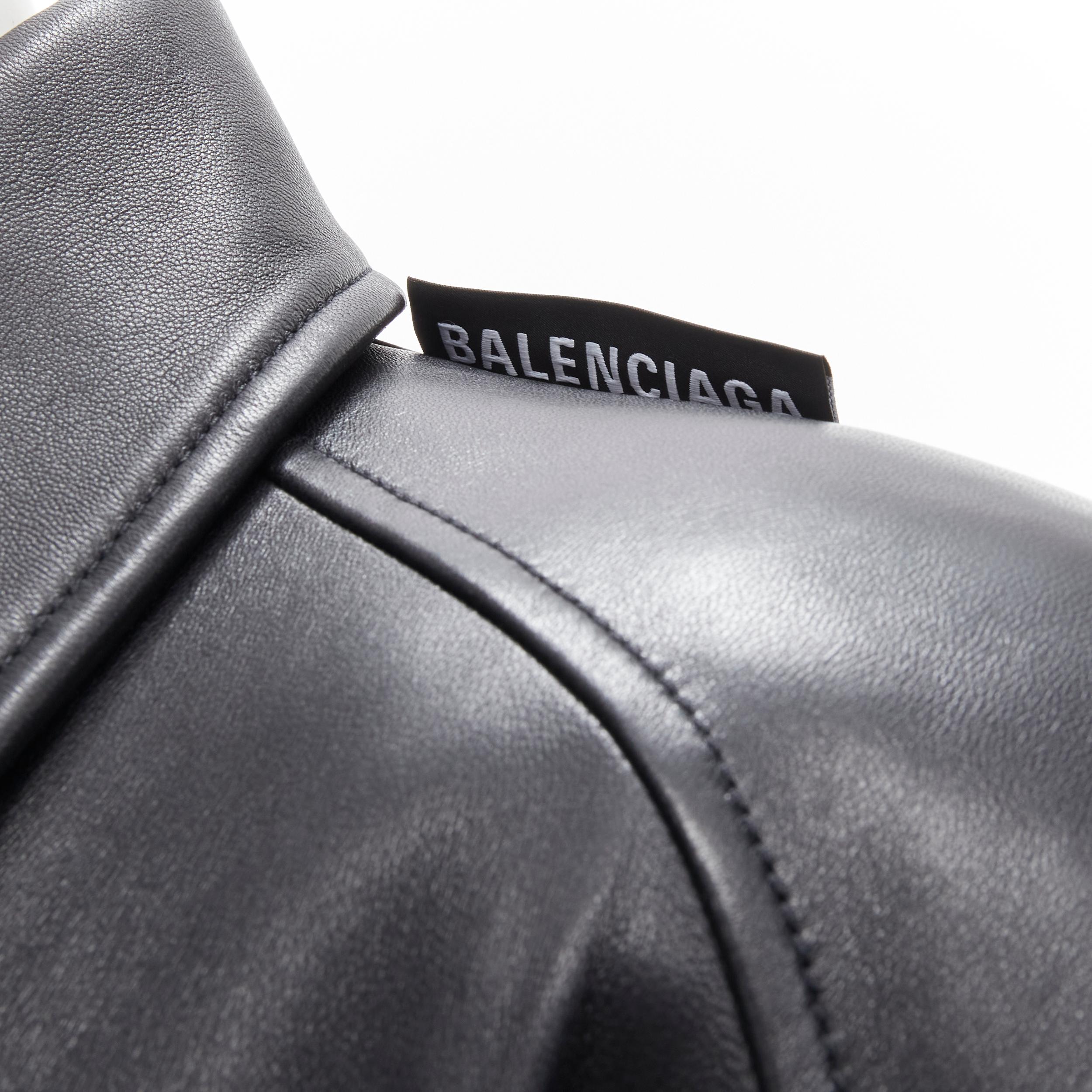 BALENCIAGA 2018 black lambskin logo tag power shoulder belted coat FR34 XS
Brand: Balenciaga
Designer: Demna
Collection: 2019 Runway
Material: Lambskin Leather
Color: Black
Pattern: Solid
Closure: Belt
Extra Detail: Black lambskin leather. Spread
