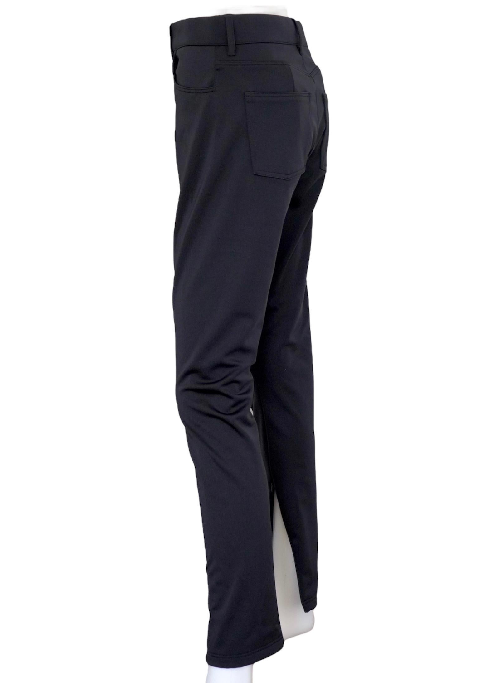 New Balenciaga Ankle Zip Black Pant. We have them in a sz 40. These pants feature an ankle zip on the inside of each pant leg. They also have a sleek stretch material. Three front and two back pockets. The perfect work pant, or dress it up and wear