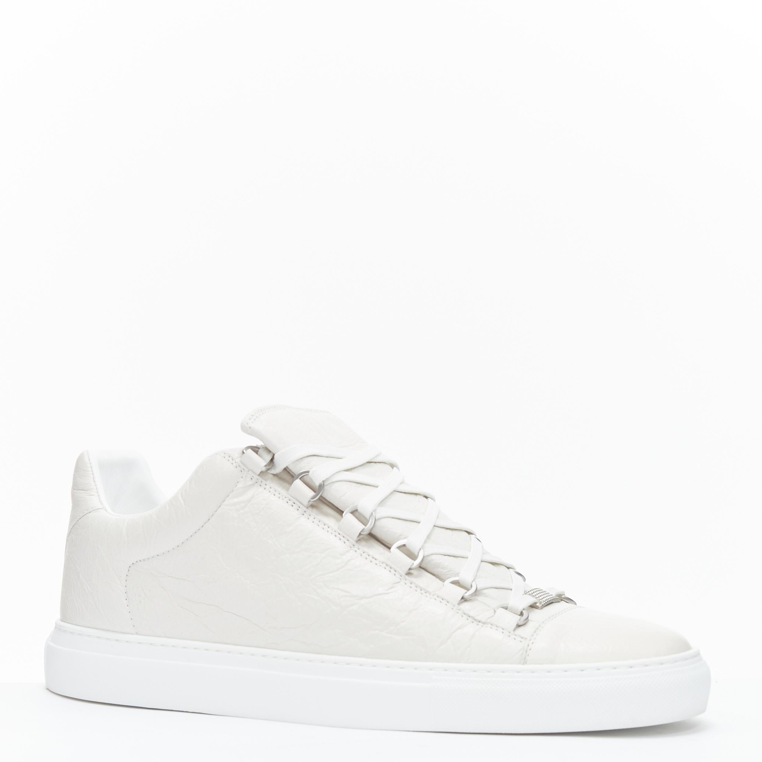 BALENCIAGA Arena Blanc off white crinkle leather low top sneaker EU44 
Reference: TGAS/B01407 
Brand: Balenciaga 
Model: Arena Low 
Material: Leather 
Color: White 
Pattern: Solid 
Closure: Lace Up 
Made in: Spain 

CONDITION: 
Condition: Excellent,