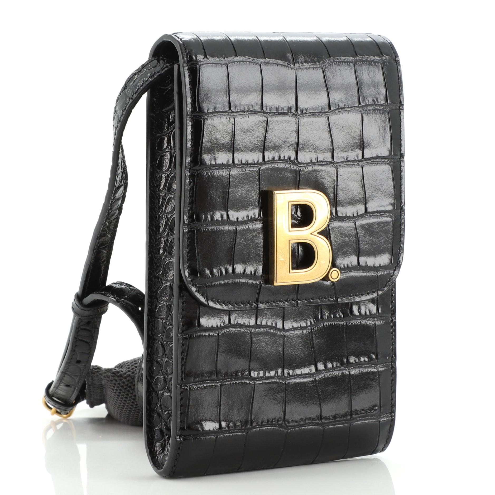 Balenciaga B. Umhängetasche mit Krokodilprägung aus Leder (Schwarz)