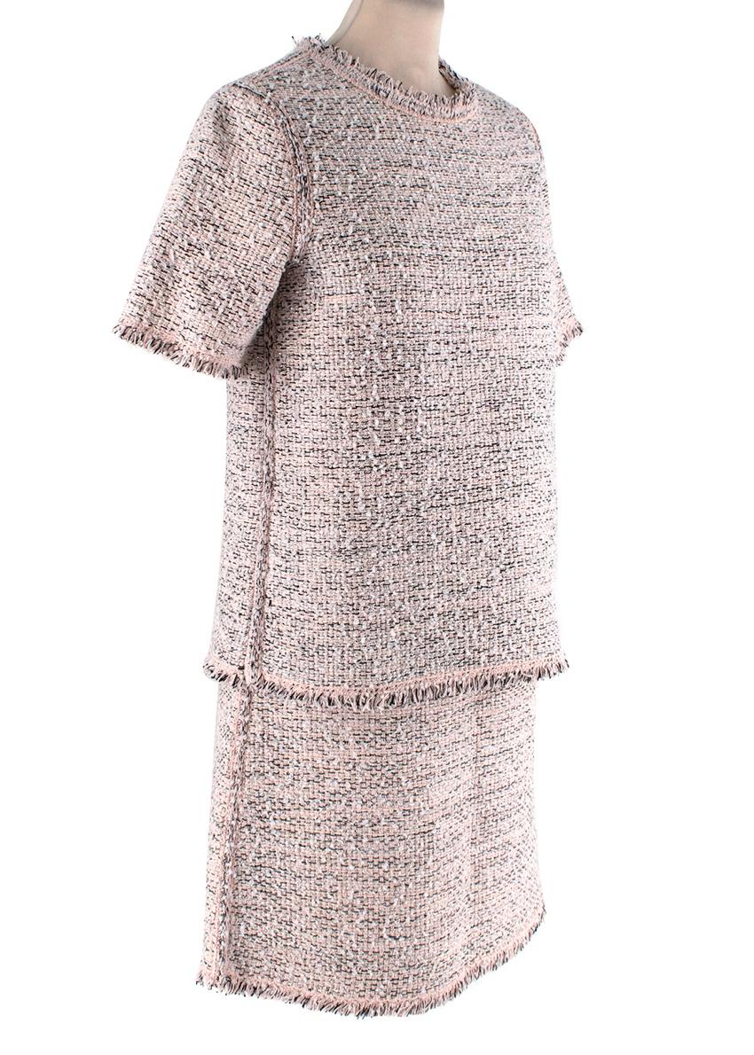 Balenciaga Baby Pink Boucle Tweed Top & Skirt 
 

 - Resort 2016
 - Boucle weave in tones of baby pink, white, silver and black 
 -Short sleeves top with a round neckline
 -Fringed raw edge
 -Matching short skirt with concealed zip closure at the