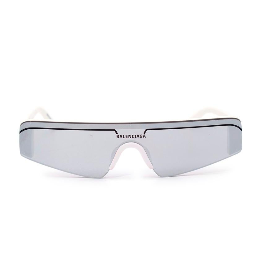  Balenciaga BB0003S Angular Frame Silver Lens Sunglasses
 

 - Angular frameless silver single lens with logo branding at the bridge 
 - Contrasting white arms with logo at the top
 -100% UV protection
 

 Materials 
 100% Acetate 
 

 Made in Italy