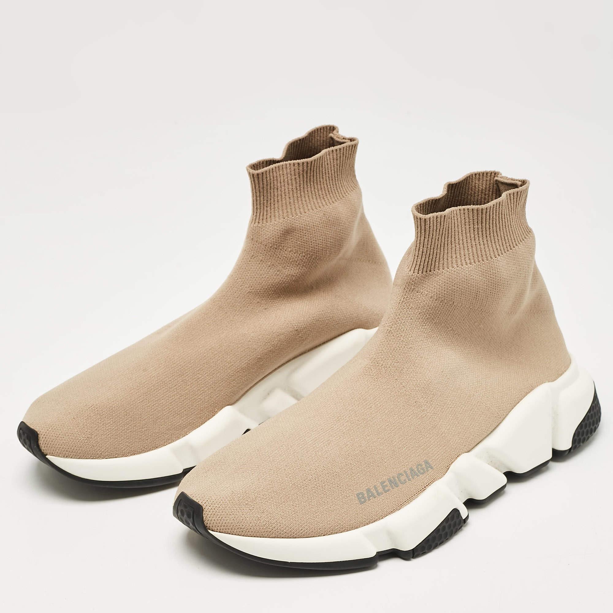 Perfect for pairing with your favorite jeans or casual suits these sneakers are a must have for anyone looking to add a touch of luxury to their casual wardrobe.