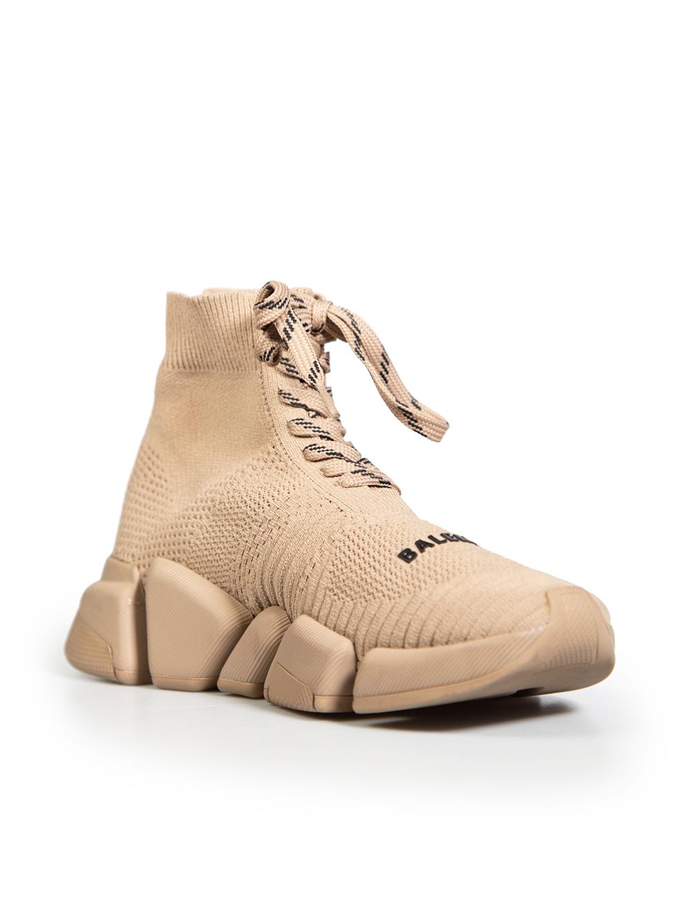 CONDITION is Very good. Minimal wear to trainers is evident. Minimal wear to midsoles, light scratches on the right side of the right shoe and right side of the left shoe on this used Balenciaga designer resale item.
 
 Details
 Model: Speed
 Beige
