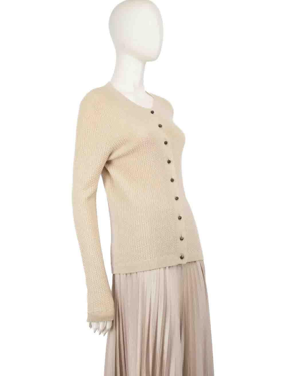CONDITION is Very good. Minimal wear to cardigan is evident. Minimal pilling to overall material especially around hemline and a pluck to the weave on the front can be seen on this used Balenciaga designer resale item.
 
 
 
 Details
 
 
 Beige
 
