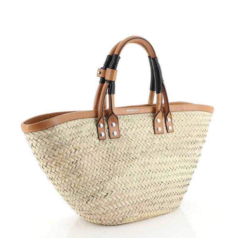 Condition: Great. Minor scuffs on leather trims and handles, scratches on hardware. 
Accessories: No Accessories 
Measurements: 
Designer: Balenciaga
Model: Bistrot Panier Bag Straw Small
Exterior Material: Straw 
Exterior Color: Neutral 
Interior