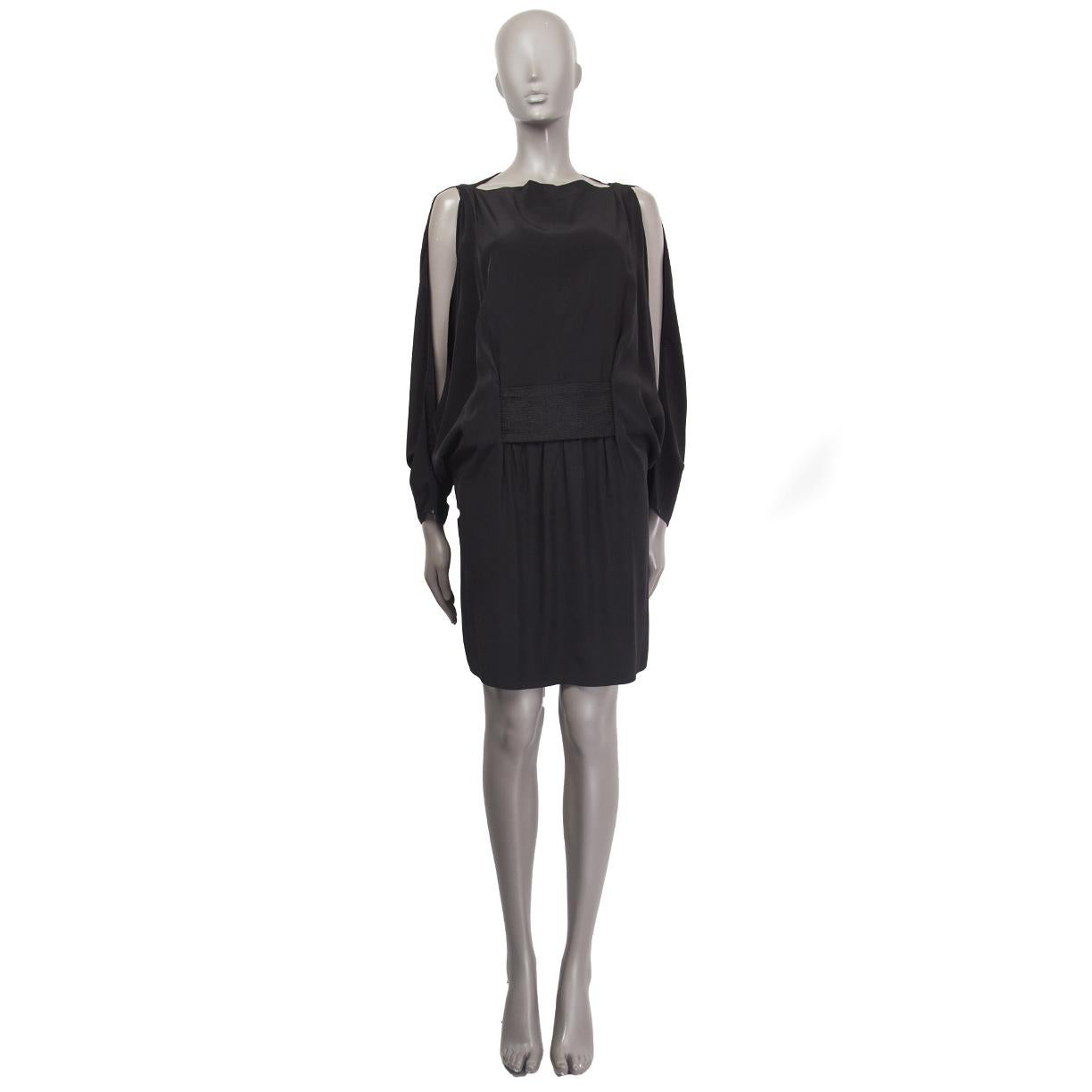100% authentic Balenciaga cold shoulder cocktail dress in black acetate (85%) and silk (15%) with rib waist detail. Has batwing sleeves (sleeve measurement taken from the neck. Loose fit. Has been worn and is in excellent