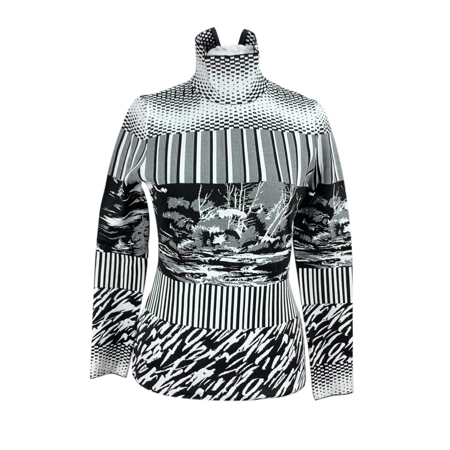 Black and white Balenciaga all-over pattern turtleneck jumper. It features a turtleneck, long sleeves, slim-fit and a rear zip. Composition: 100% Polyepropylene. Size: 38 FR (The size shown for this item is the size indicated by the designer on the