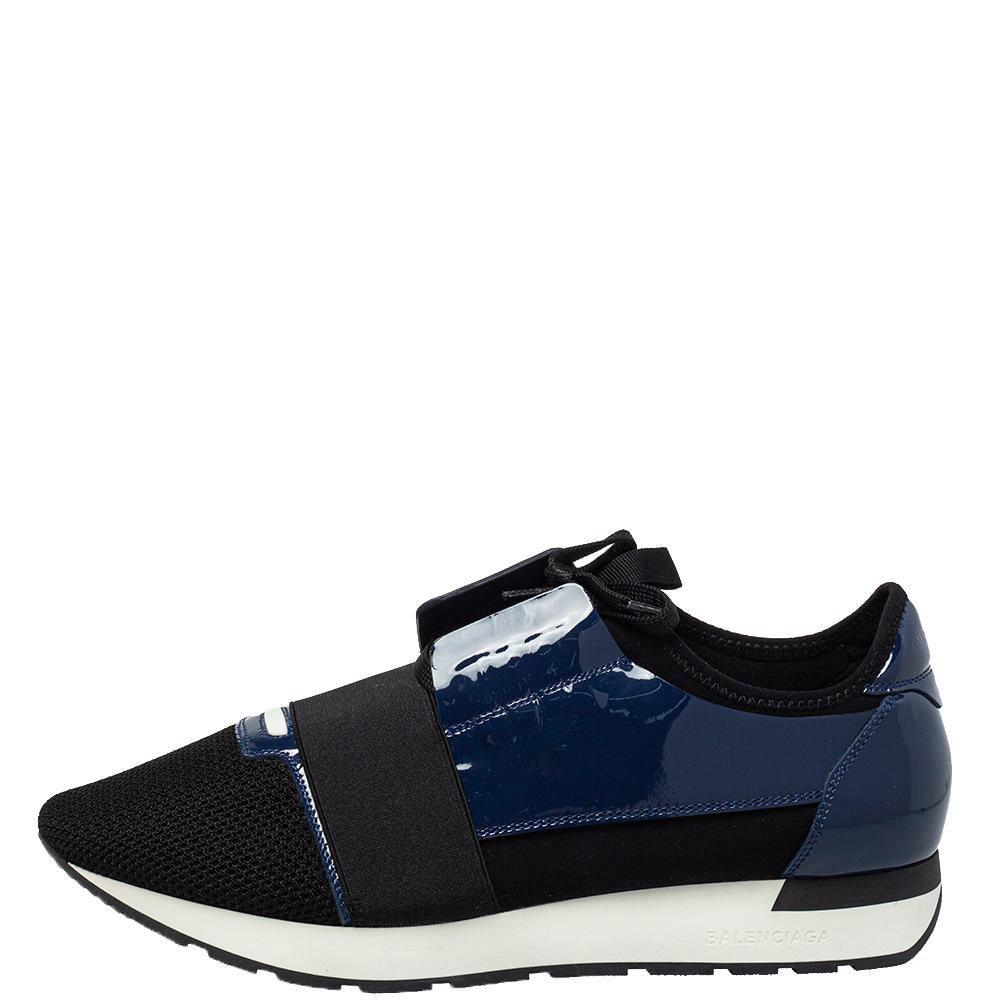 Let your latest shoe addition be this pair of Race Runners sneakers from Balenciaga. These black sneakers have been crafted from patent leather, and mesh and feature a chic silhouette. They flaunt-covered toes, strap detailing on the vamps, and
