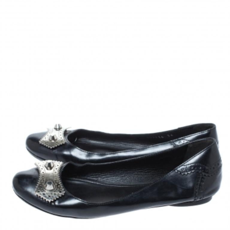We love how Balenciaga keeps amazing us with unique creations and these Arena ballet flats are one such pair. Incorporating their signature studs, the vamps have been decorated with scalloped studded motifs and the black leather body also features