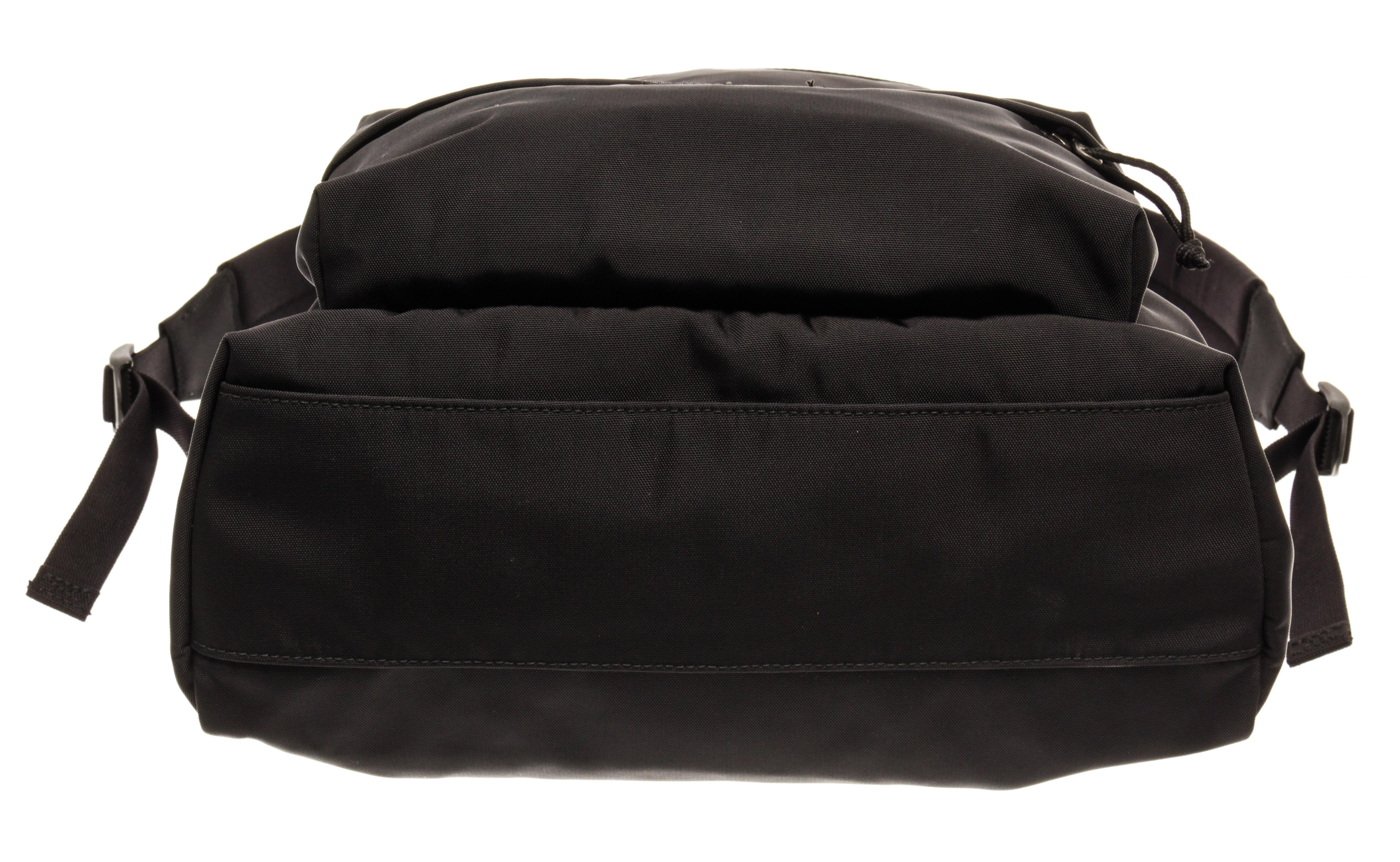 Balenciaga Black Canvas Explorer Backpack with a top handle, exterior zipper pocket, two slip pockets and a zipper closure. 

79041MSC