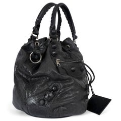 BALENCIAGA black distressed leather GIANT COVERED POMPON Hobo Bag