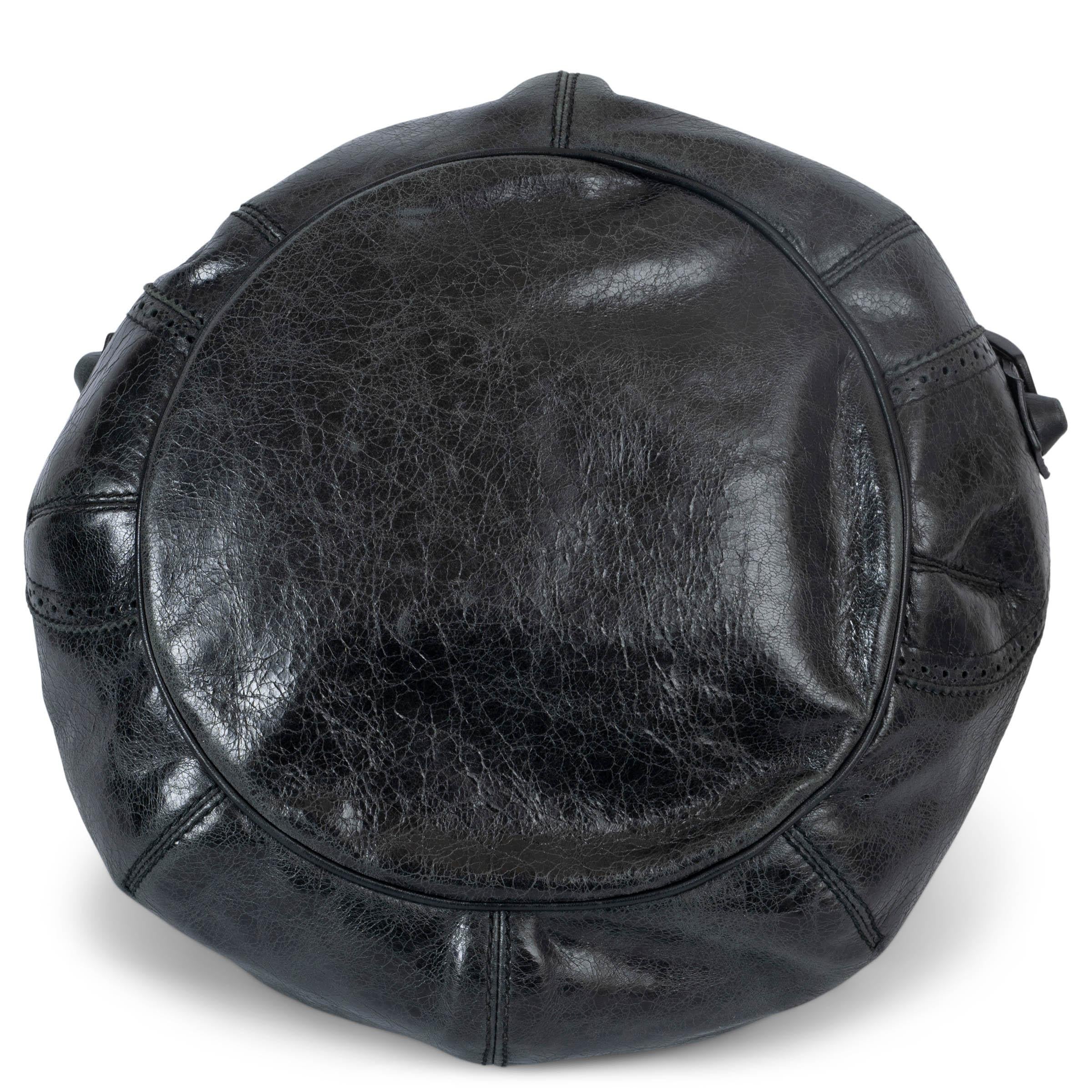 BALENCIAGA black distressed leather GIANT COVERED POMPON Hobo Bag In Fair Condition In Zürich, CH