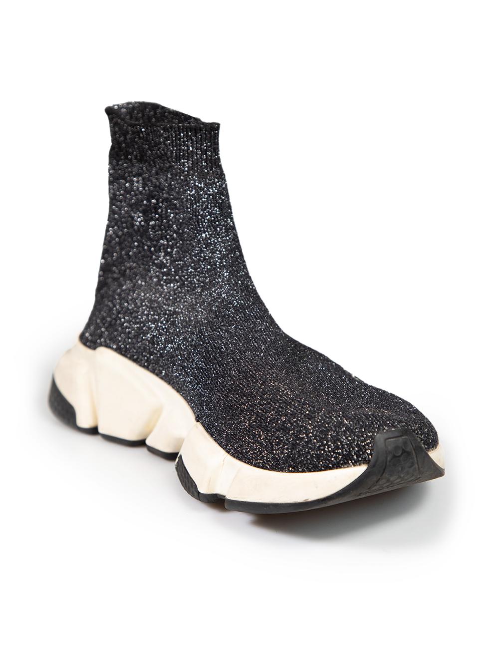 CONDITION is Good. Minor wear to trainers is evident. Light discolouration and scratches to rubber soles on both shoes on this used Balenciaga designer resale item.
 
 
 
 Details
 
 
 Model: Speed
 
 Black
 
 Cloth textile
 
 Sock trainers
 
