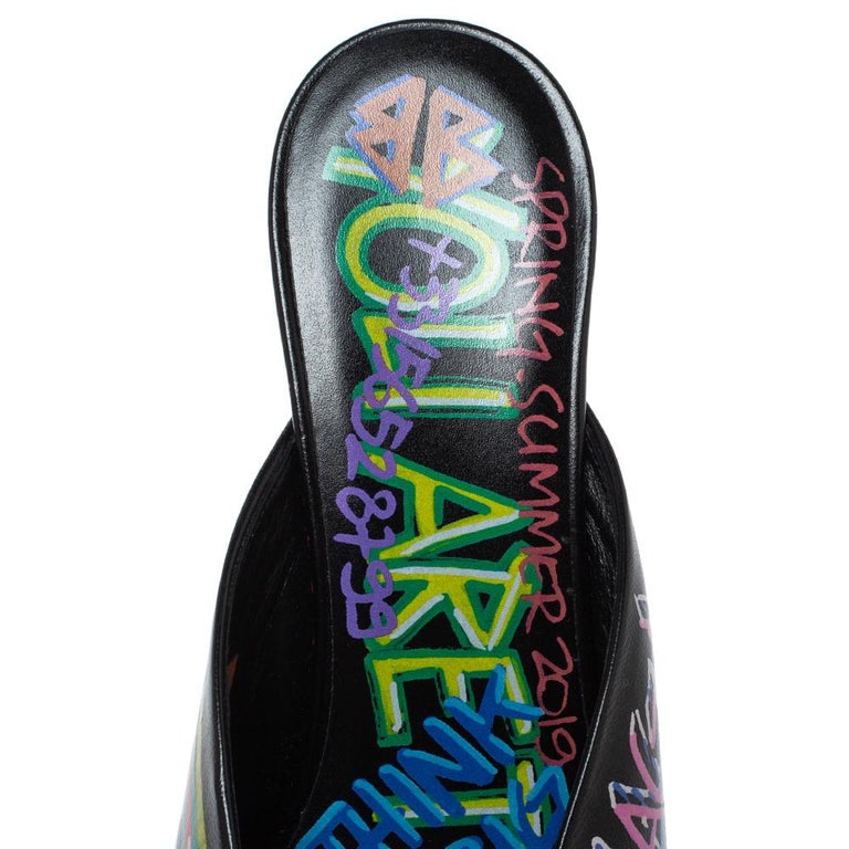 SNEAKER MULES IN BLACK CANVAS GRAFFITI LOGO
