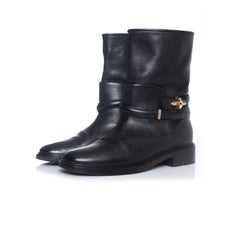 Balenciaga, schwarze Bikerjackstiefel aus Leder mit Maserung