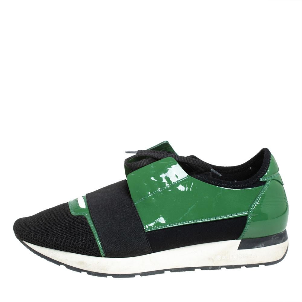 Let your latest shoe addition be this pair of Race Runners sneakers from Balenciaga. These black sneakers have been crafted from patent leather, and mesh and feature a chic silhouette. They flaunt-covered toes, strap detailing on the vamps, and