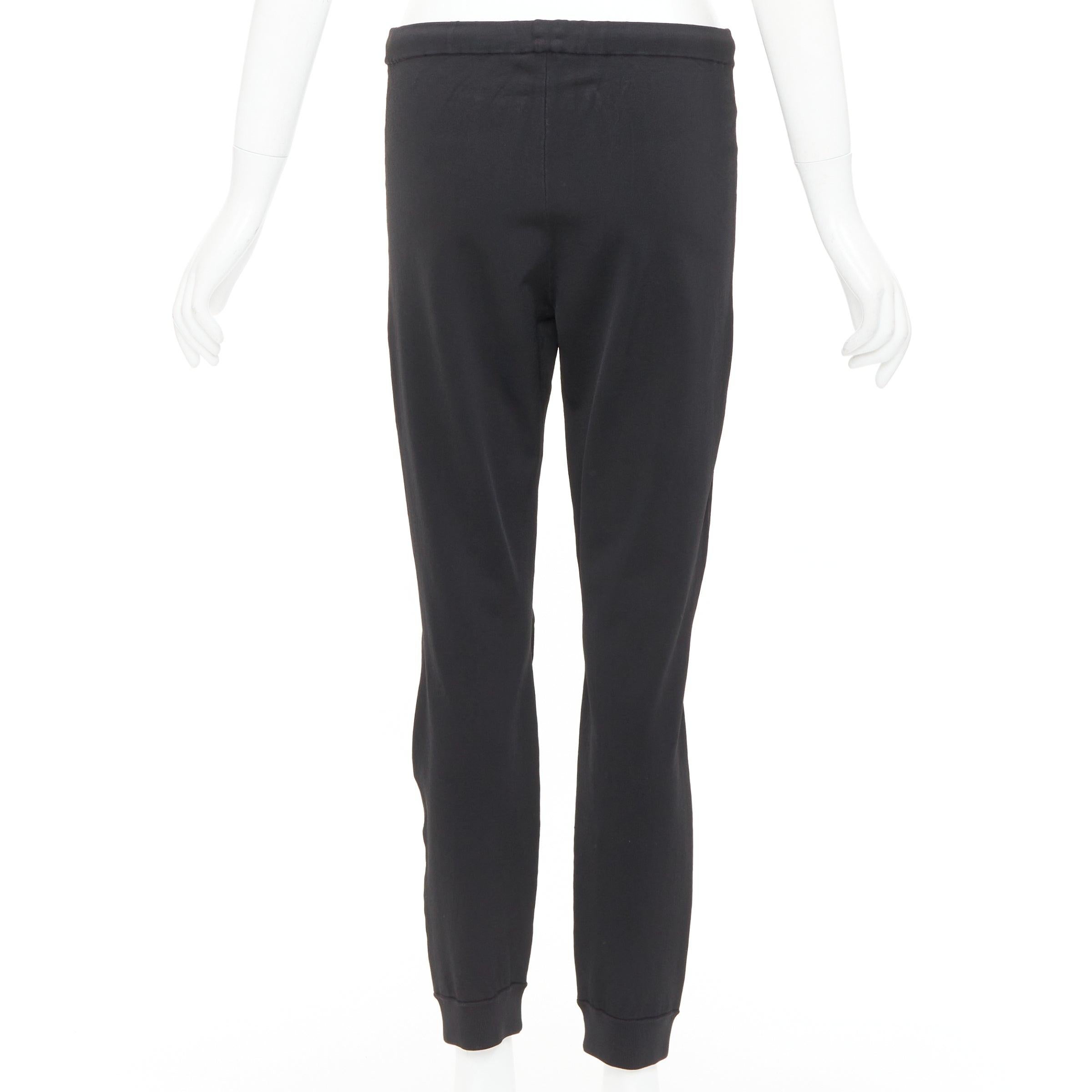 De las mujeres BALENCIAGA black hidden drawstring knee darts cropped jogger pants en venta