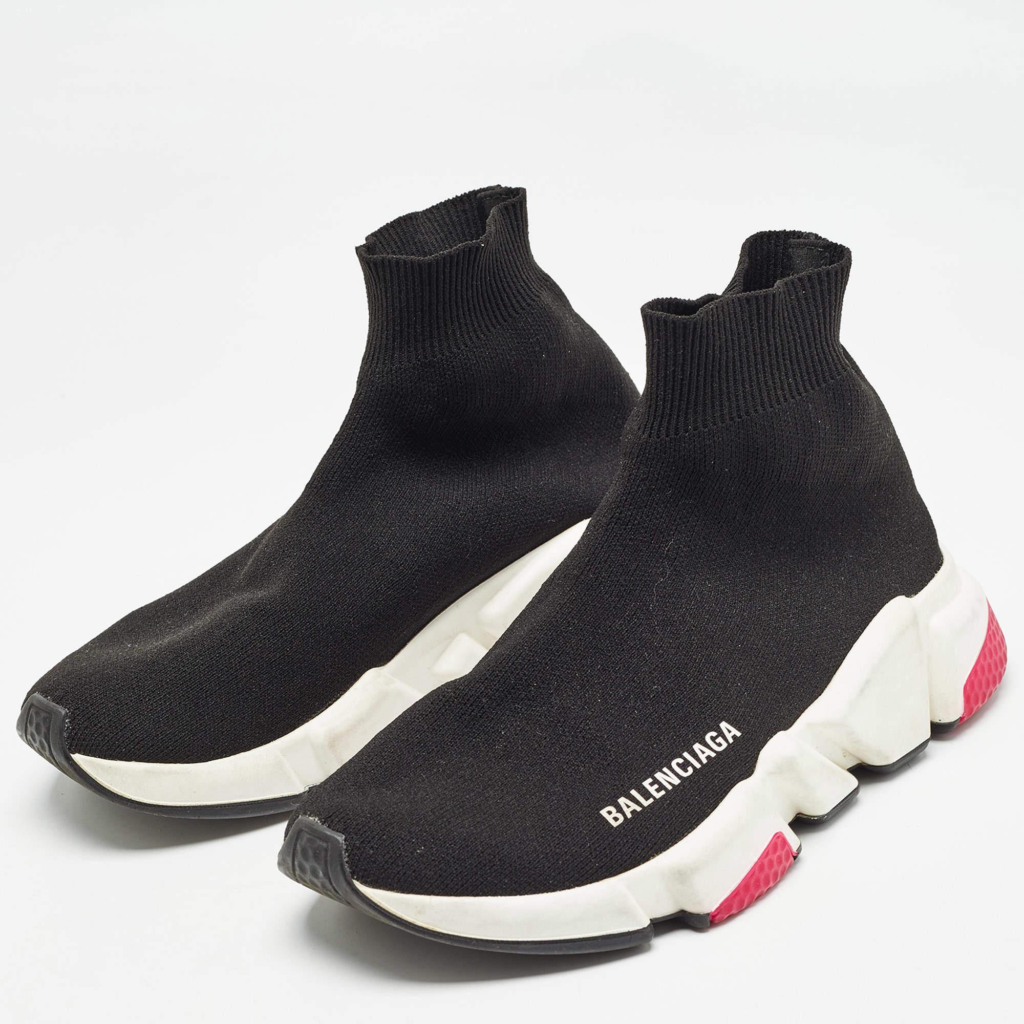 Coming in a classic silhouette these designer sneakers are a seamless combination of luxury comfort and style. These sneakers are finished with signature details and comfortable insoles.