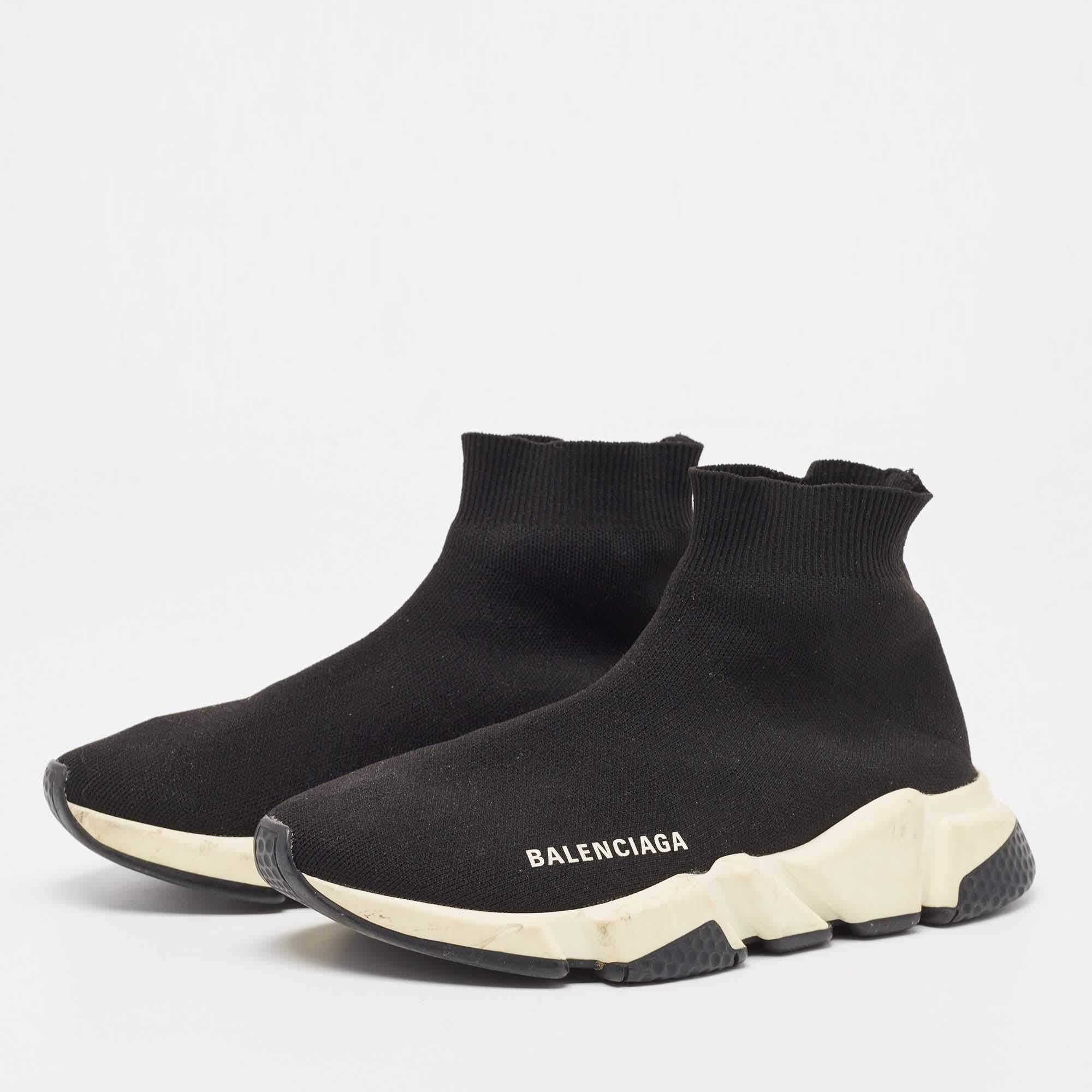Coming in a classic silhouette these designer sneakers are a seamless combination of luxury comfort and style. These sneakers are finished with signature details and comfortable insoles.