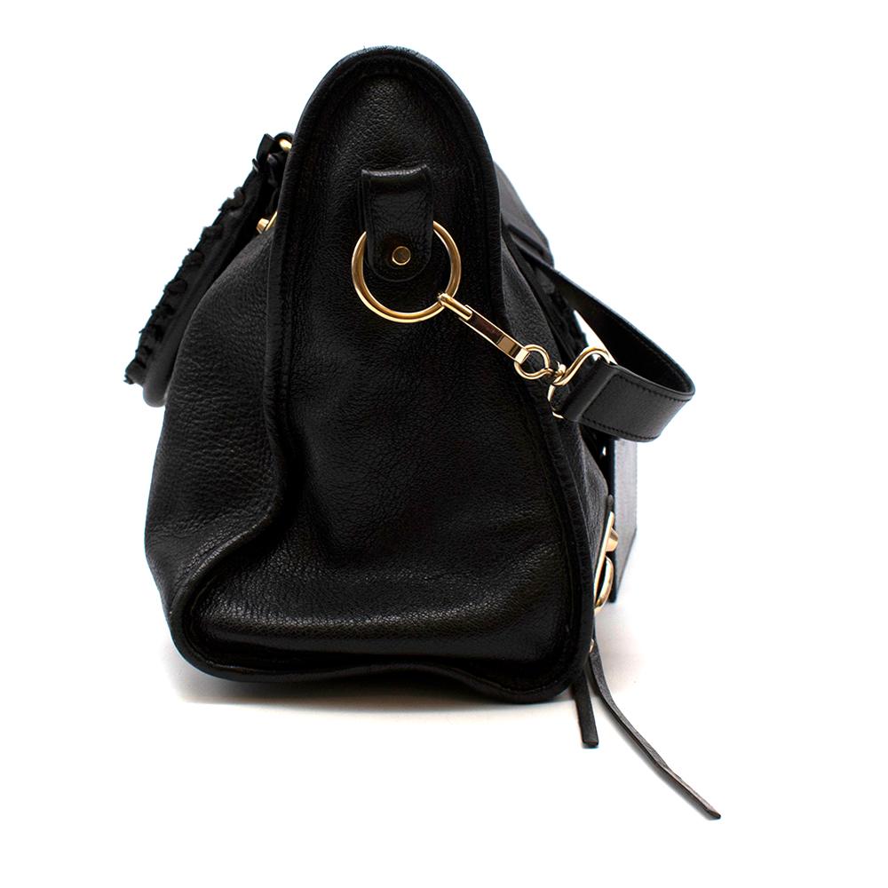 Balenciaga Black Leather Classic City Bag

-Classic, timeless design
-Gold-tone metal hardware
-Detachable strap
-Large interior compartment
-Zipper pocket inside

Materials: 100% calf leather

Made in Italy

(Seam to Seam):
15 x 38 x 25cm
