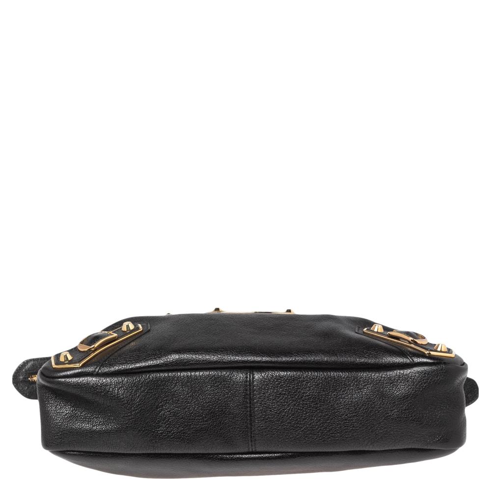 Balenciaga is known for its finely made products and the City bags are one of them. Effortless and stylish, this leather bag will be your go-to for multiple occasions. It has the signature details of buckles, studs, and the front zipper. Two top