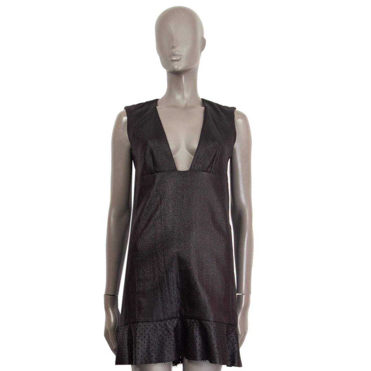 100% authentic Balenciaga sleeveless leather effect dress in black cotton (48%), acetate (39%) and polyamide (13%) with a wide decolleté cut and a perforated-band detail at the bottom-hem. Closes with an hook and an invisible zipper on the back.