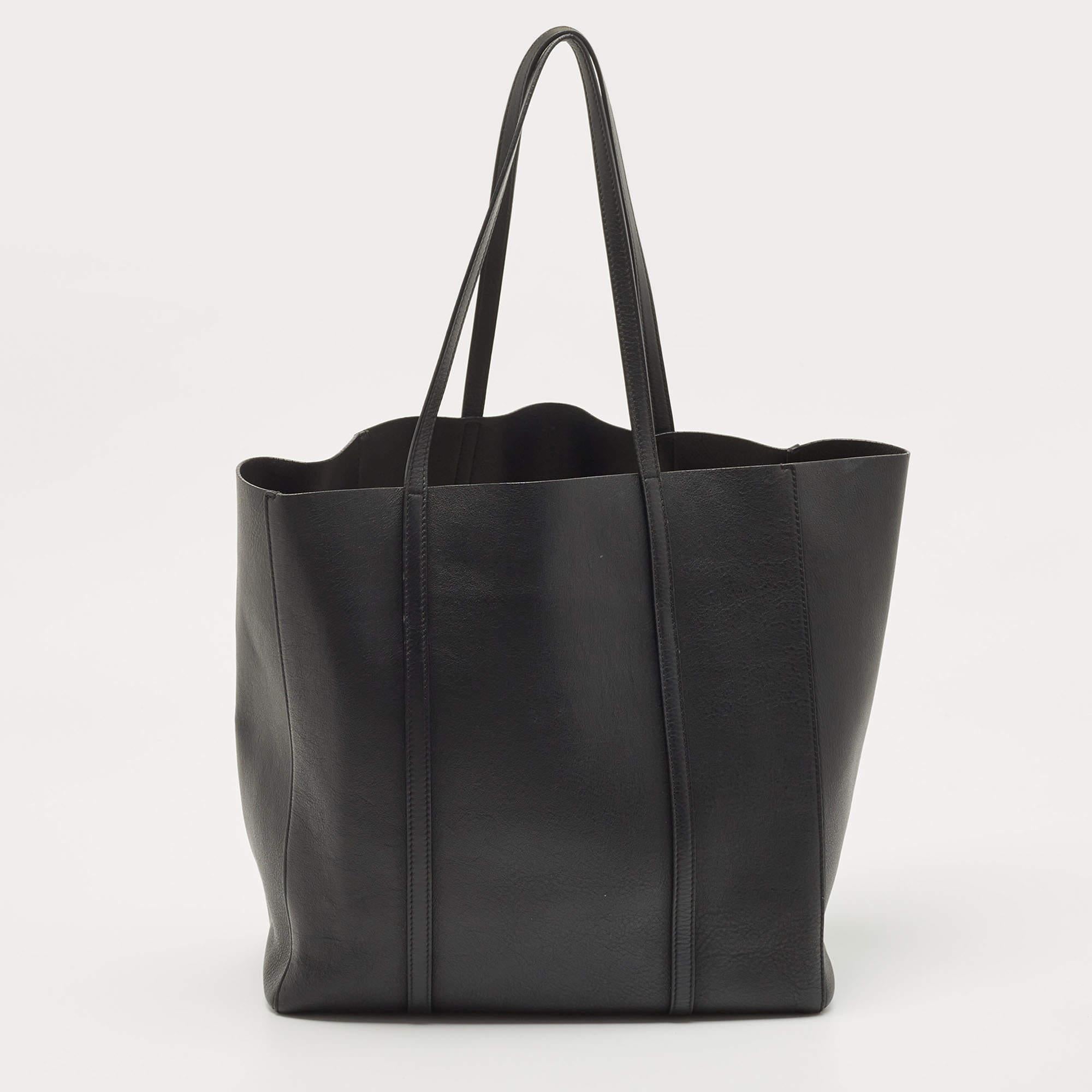 This Balenciaga black tote for women is super classy and functional, perfect for everyday use. We like the simple details and its high-quality finish.


