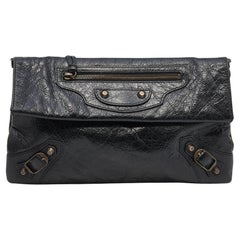 Balenciaga - Pochette en cuir noir géant 12 en laiton antique avec motif enveloppe