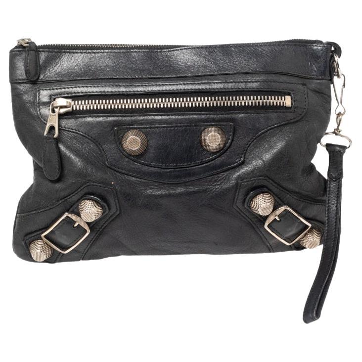 BALENCIAGA black leather 'Lune' clutch bag with gold hardware at ...