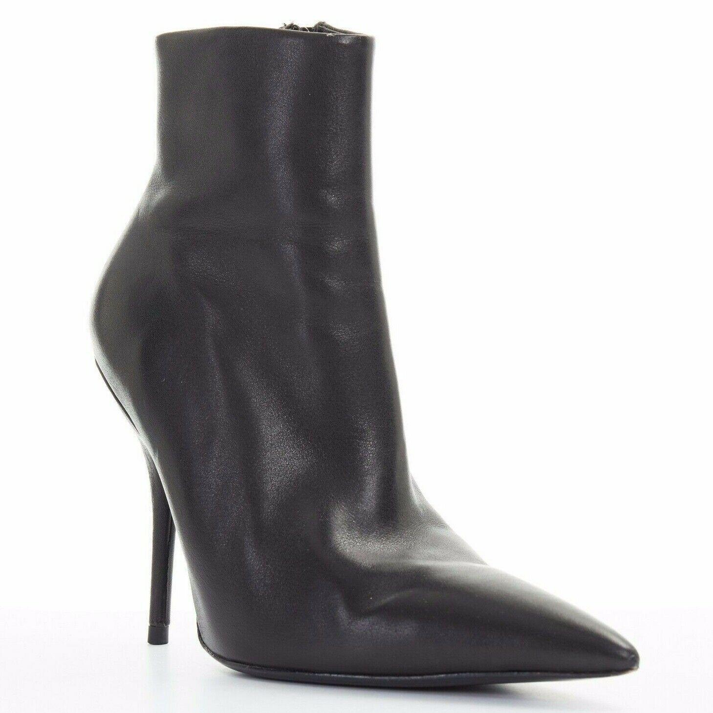 BALENCIAGA black leather Knife pointed toe sculpted slim heel ankle bootie EU35
BALENCIAGA BY DEMNA GVASALIA
Knife bootie. 
Black leather upper. 
Extreme pointed toe. 
Sculted slim high heel. 
Slim fit. 
Zip closure on inner edge. 
Made in