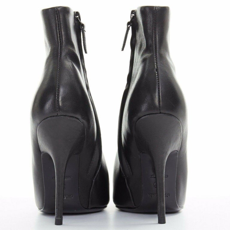BALENCIAGA 25S POINTED-TOE HIGH HEELS 70 MM IN BLACK CALFSKIN WITH GOLD HARDWARE