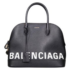 Bolso Balenciaga Ville de piel negra con logo estampado