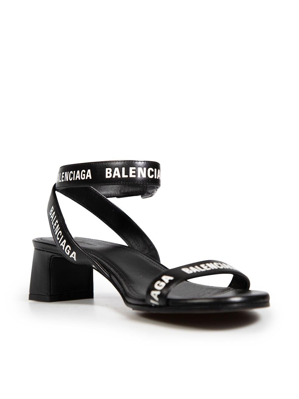 CONDITION is Very good. Hardly any visible wear to sandals is evident on this used Balenciaga designer resale item.
 Details
 Black
 Leather
 Sandals
 Open toe
 Ankle straps
 Block heels
 Logo printed straps
 
 
 Made in Italy
 
 Composition
