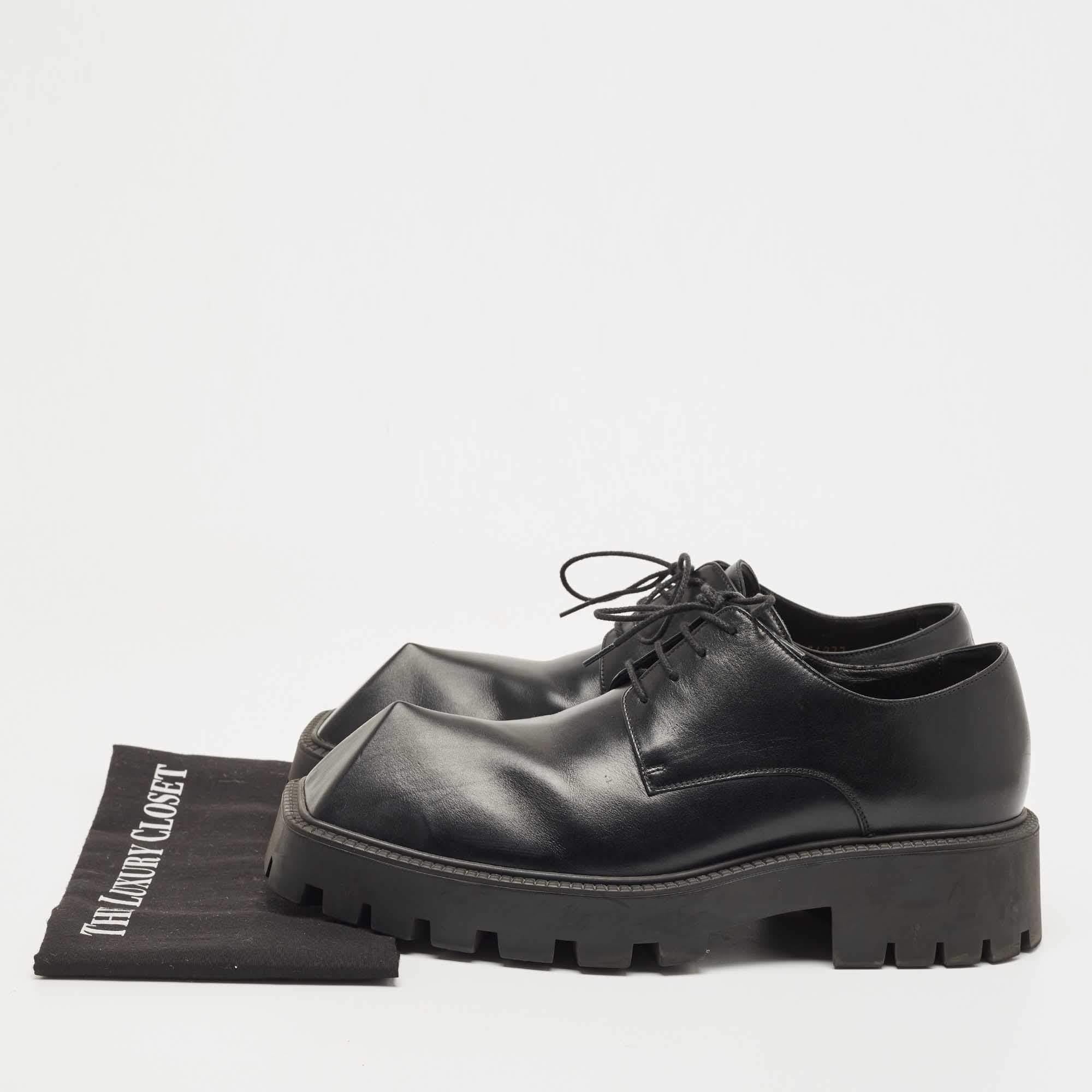 Make a statement in these Balenciaga Rhino derby shoes that are made of leather. They have unique pyramid-shaped toes, upper laces, and platform soles.

