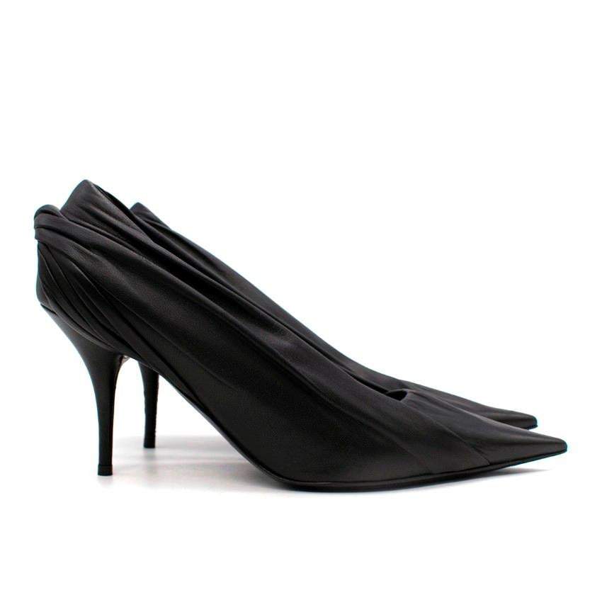  Balenciaga Black Leather Ruched Knife Pumps

- Black Leather Body
- Classic Ruched Style
- Knife Point Toe
- Knot detail to the back of the shoe
- Classic Heel
- Made In Italy
- Dust Bag included

PLEASE NOTE, THESE ITEMS ARE PRE-OWNED AND MAY SHOW