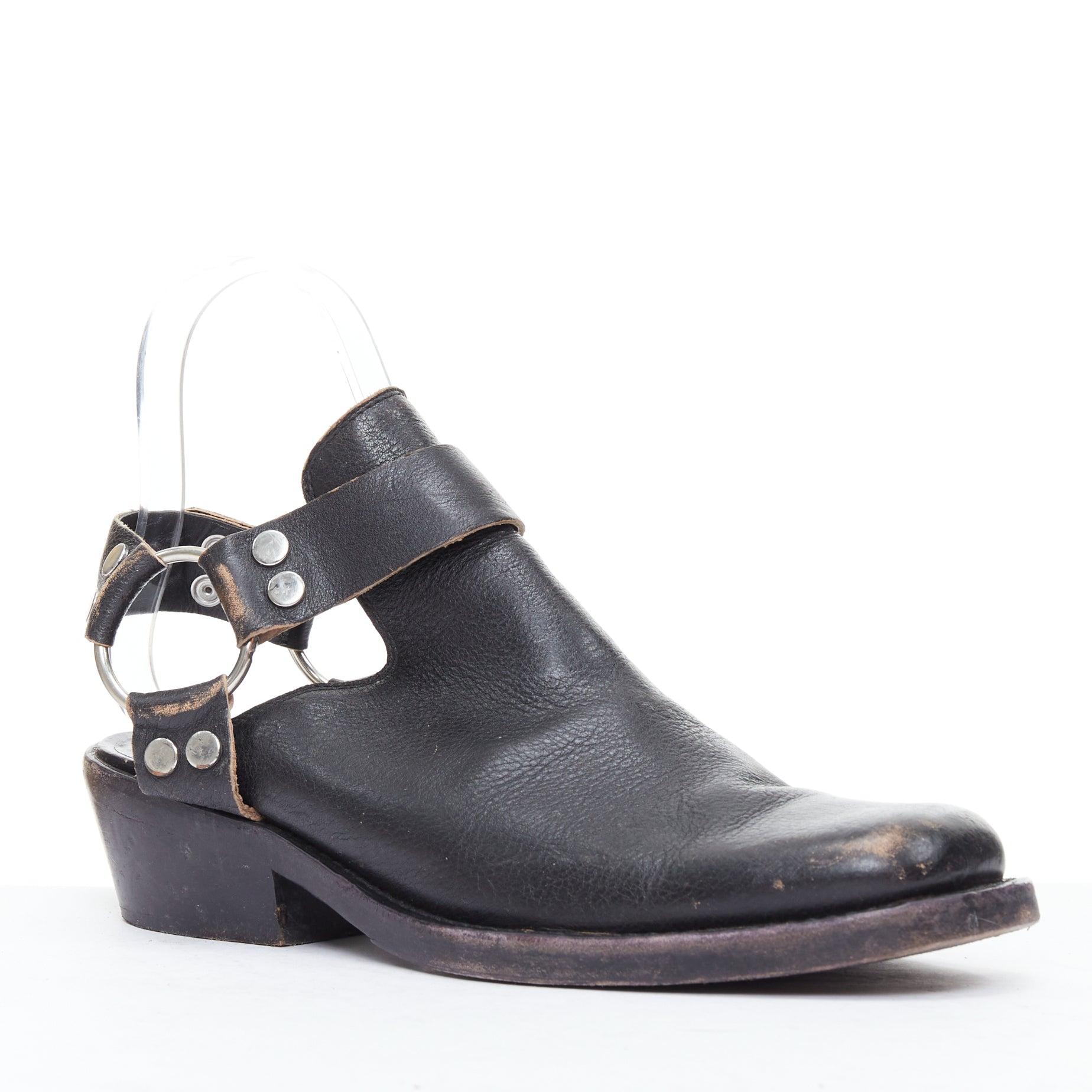 BALENCIAGA black leather silver buckle distressed cuban mules EU38.5
Reference: ECLO/A00114
Brand: Balenciaga
Material: Leather, Metal
Color: Black, Silver
Pattern: Solid
Closure: Slip On
Lining: Black Leather
Extra Details: Black grain leather