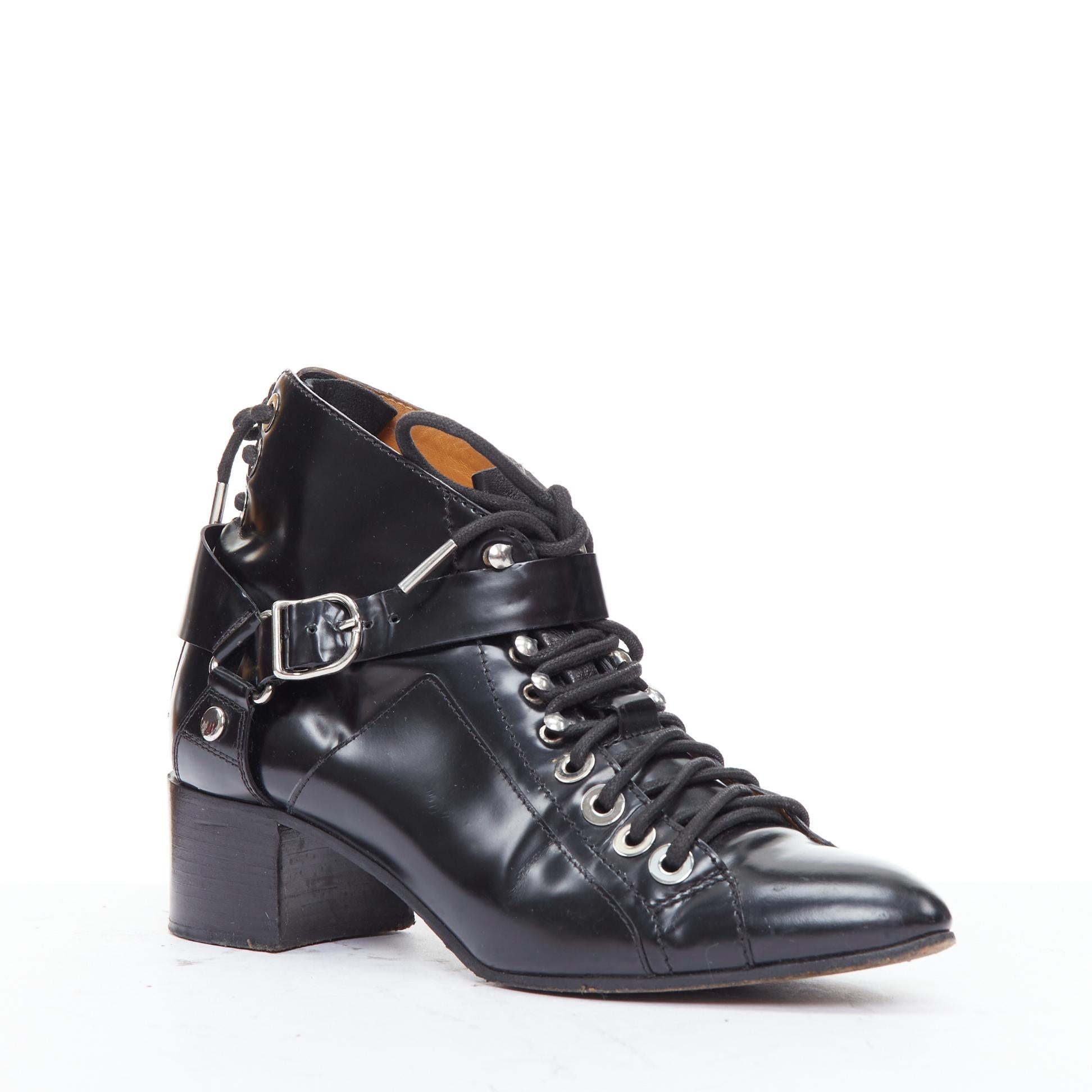 BALENCIAGA black leather silver buckles laced harness booties EU38.5
Reference: ECLO/A00077
Brand: Balenciaga
Material: Leather
Color: Black, Silver
Pattern: Solid
Closure: Lace Up
Lining: Brown Leather
Made in: Italy

CONDITION:
Condition: Good,