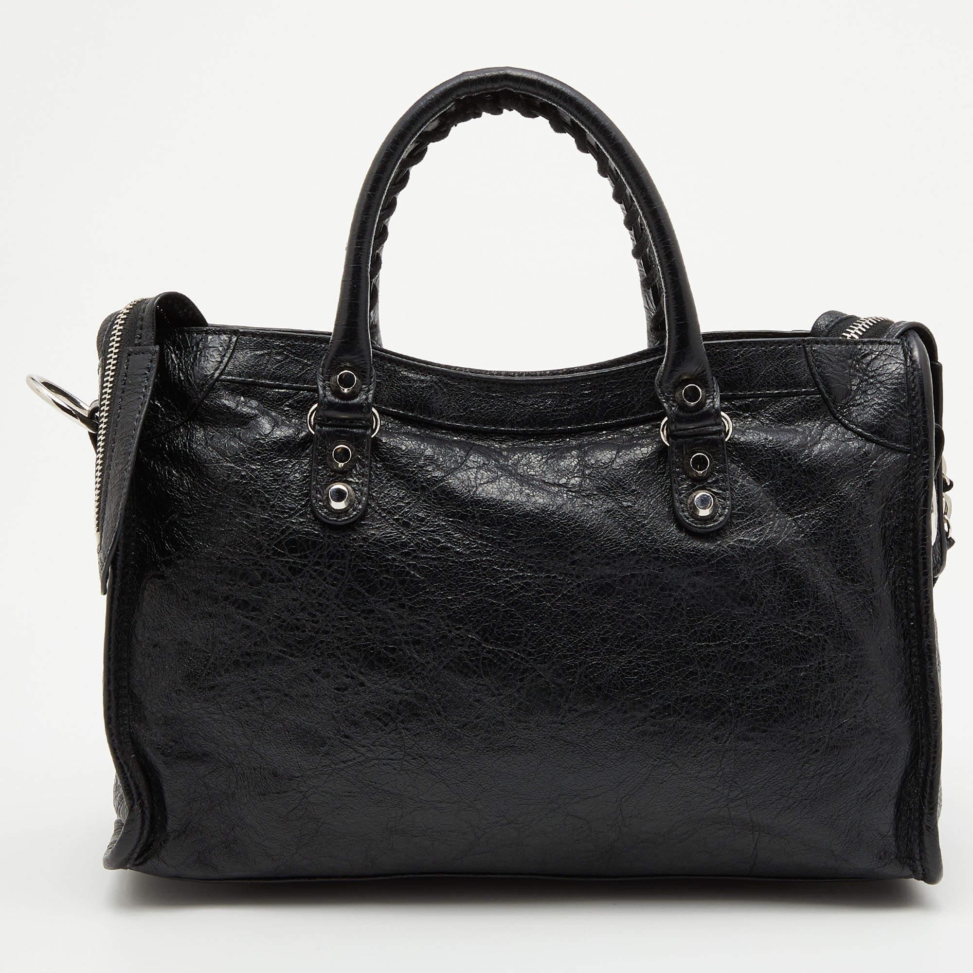 This alluring tote bag for women has been designed to assist you on any day. Convenient to carry and fashionably designed, the tote is cut with skill and sewn into a great shape. It is well-equipped to be a reliable accessory.

Includes: Original